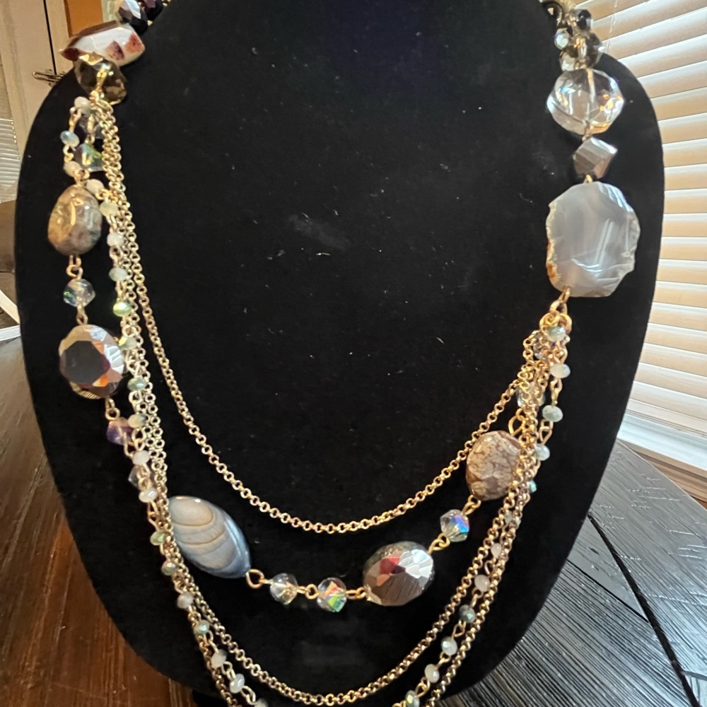 Elegant Gold and Silver Multi-Strand Necklace